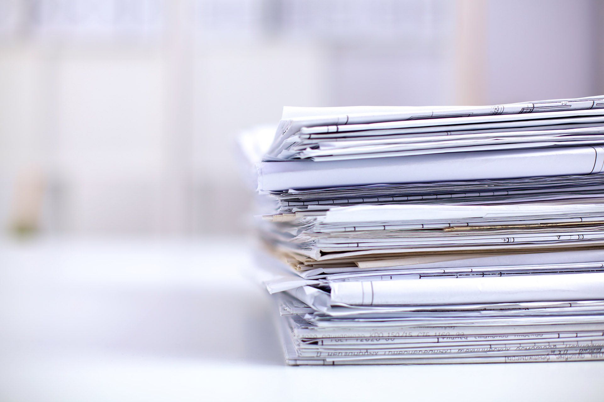 stack of documents and folders