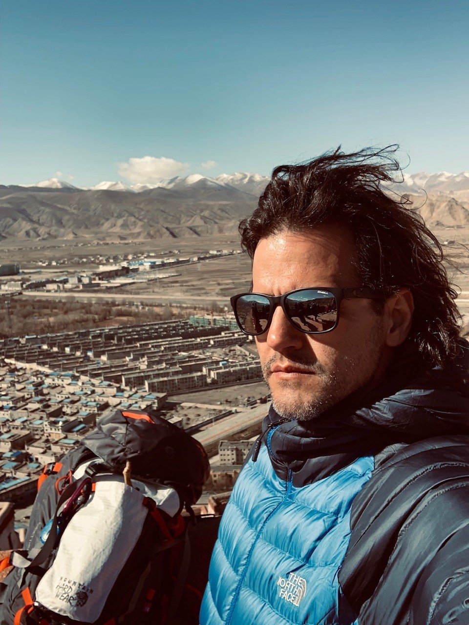 Georgios Tsianos posing on the background of Gyantse, Tibet.