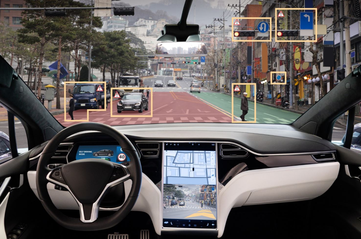 Driverless vehicle detecting road signs and pedestrians.