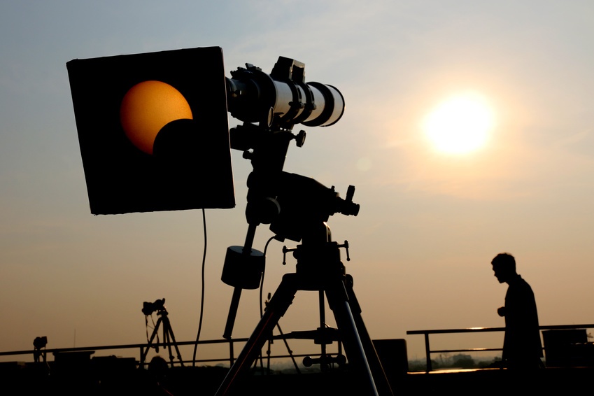 Camera viewing solar eclipse.